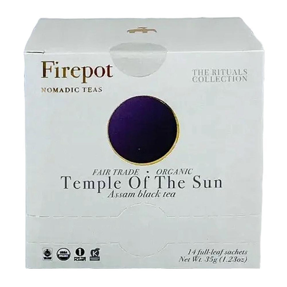 Box of 14 organic black tea sachets from Firepot Nomadic Teas, Temple of the Sun blend, in compostable packaging.